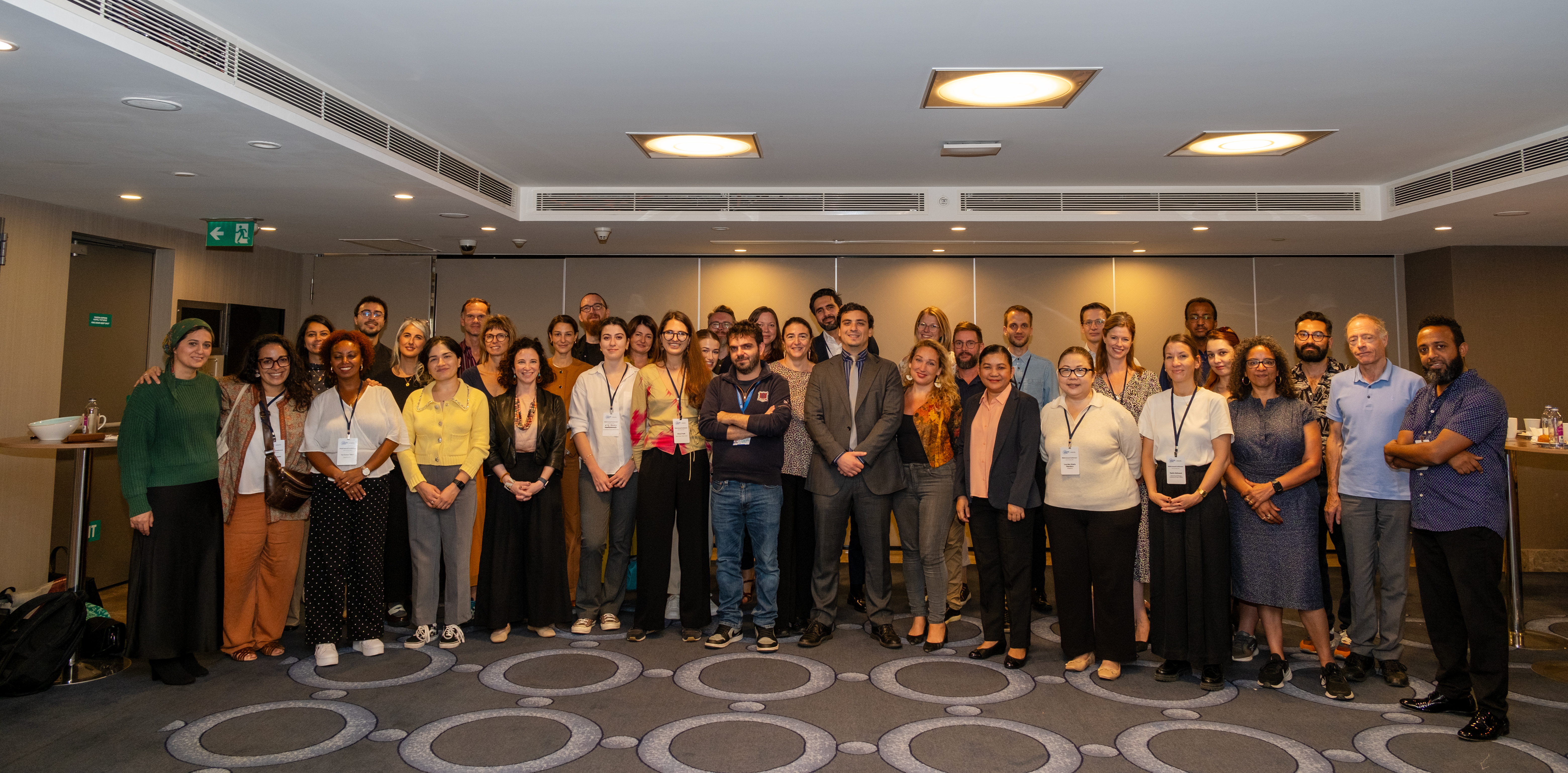 Global Family Reunification Network members posing for a group photo at the 2024 Conference
