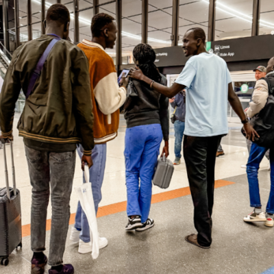 A family of refugees reuniting at the airport