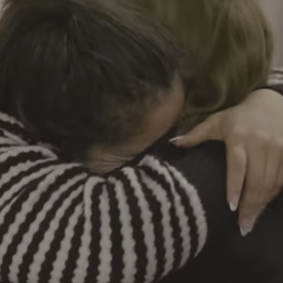 Family members hugging after reunification