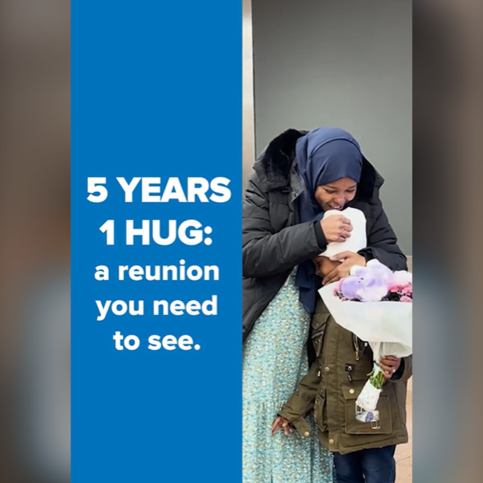 Child reuniting with mother at an airport