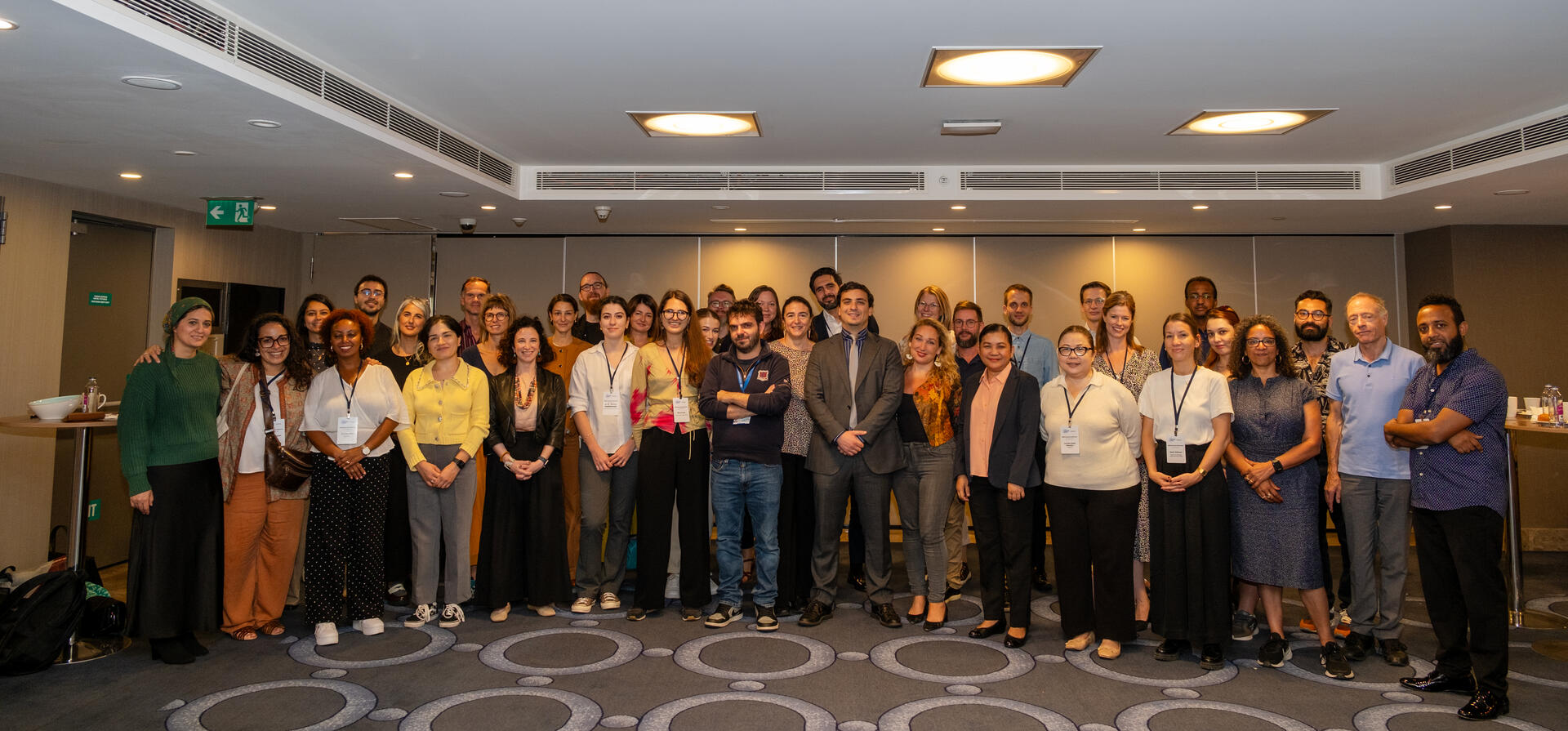 Global Family Reunification Network members posing for a group photo at the 2024 Conference