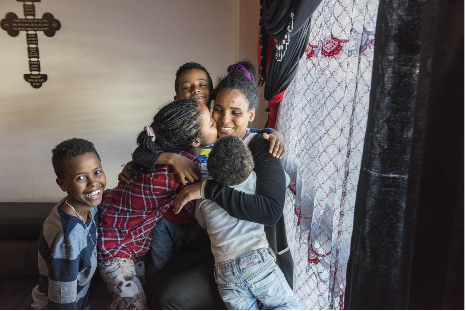 Ermias and Ksanet were torn apart from their mom and youngest siblings when they fled conflict in Eritrea. After four years of separation, the family is reunited in Switzerland.
