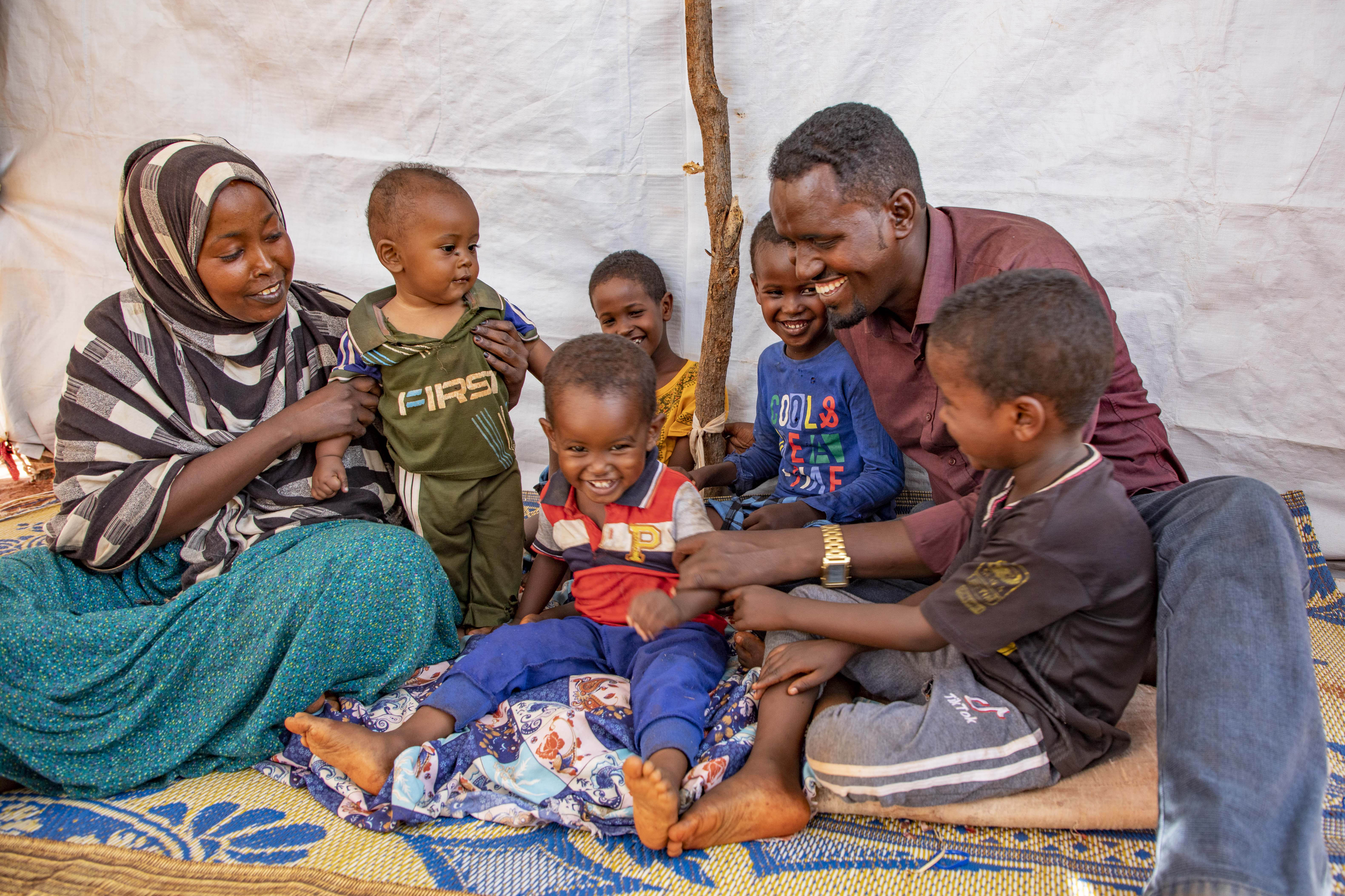 Ethiopia. Refugee leader rebuilds his life with his family